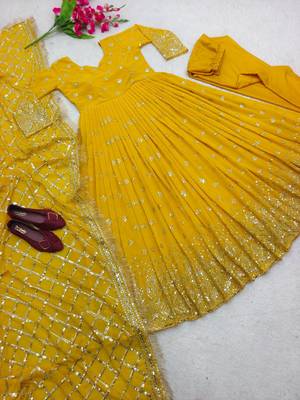 yellow color hevvy sequins emrodery work faux georgette gown set 3