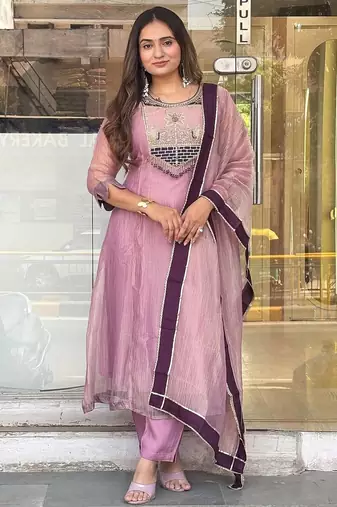 pink color embroidery and thread work with hand stitched beads and latkan work silk blend kurti set