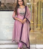 pink color embroidery and thread work with hand stitched beads and latkan work silk blend kurti set