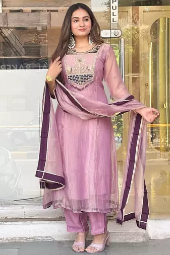 pink color embroidery and thread work with hand stitched beads and latkan work silk blend kurti set