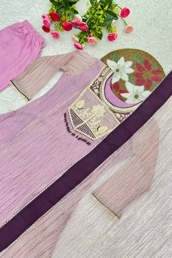 pink color embroidery and thread work with hand stitched beads and latkan work silk blend kurti set