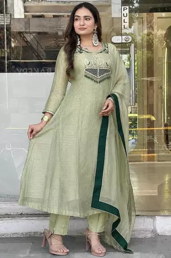 sea green color embroidery and thread work with hand stitched beads and latkan work silk blend kurti set