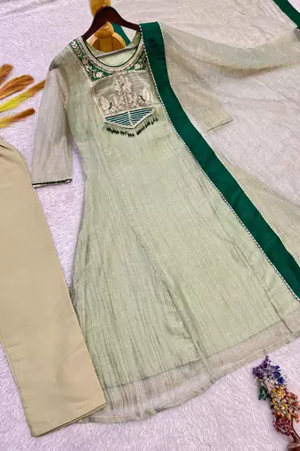 sea green color embroidery and thread work with hand stitched beads and latkan work silk blend kurti set