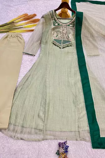 sea green color embroidery and thread work with hand stitched beads and latkan work silk blend kurti set
