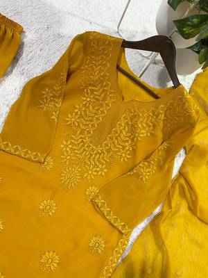 mustard color embroidery and sequince work georgette salwar suit 2