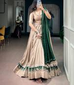 women beige chanderi silk embroidered border flared lehenga choli with dupatta - free size