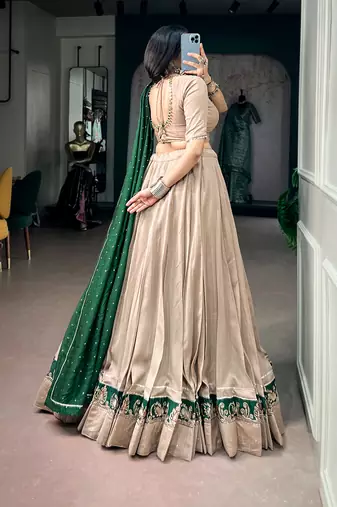 women beige chanderi silk embroidered border flared lehenga choli with dupatta - free size