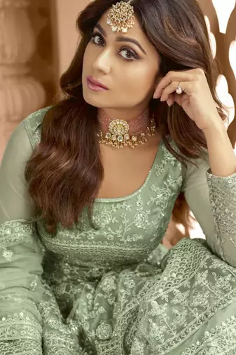 Green net embroidered anarkali set