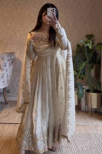 Off-white silk blend embroidered flared gown set