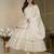 Cream silk embroidered flared gown set