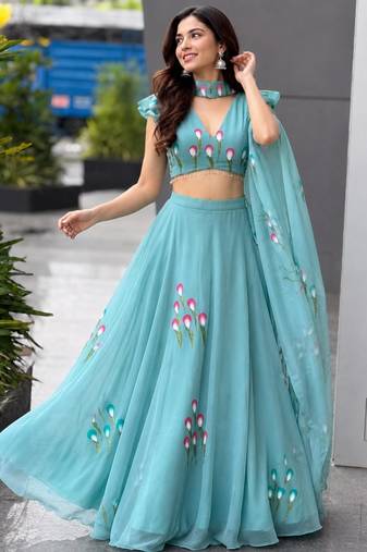 turquoise silk blend printed traditional lehenga choli with free size upto 38