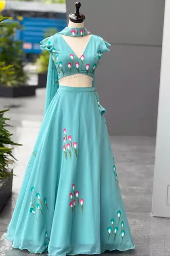 turquoise silk blend printed traditional lehenga choli with free size upto 38