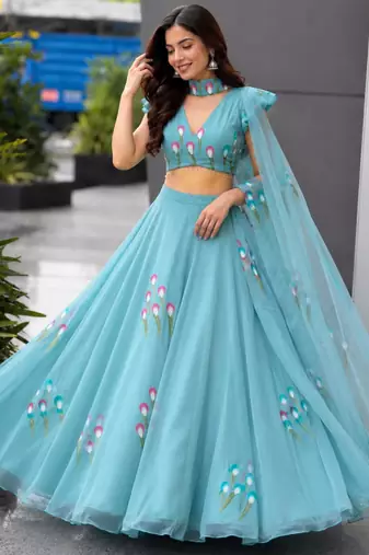 turquoise silk blend printed traditional lehenga choli with free size upto 38