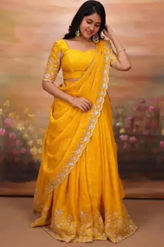 yellow georgette embroidered traditional lehenga choli with free size upto 44