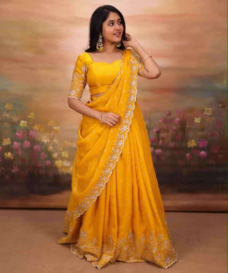 yellow georgette embroidered traditional lehenga choli with free size upto 44