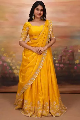 yellow georgette embroidered traditional lehenga choli with free size upto 44