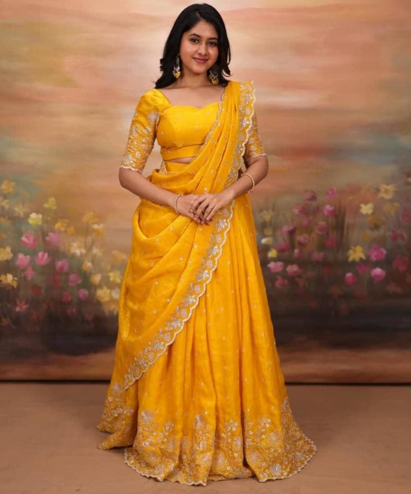 yellow georgette embroidered traditional lehenga choli with free size upto 44