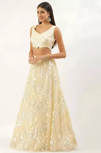 antique gold net embroidered traditional lehenga choli with free size upto 42