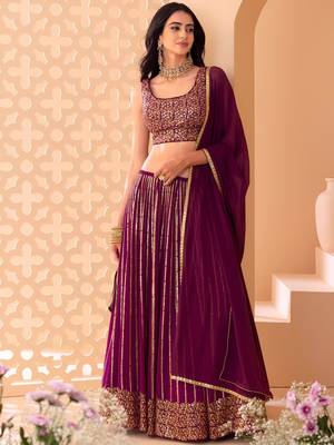wine net embroidered traditional lehenga choli with free size upto 42 1