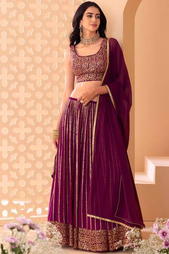 wine net embroidered traditional lehenga choli with free size upto 42