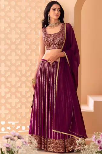wine net embroidered traditional lehenga choli with free size upto 42