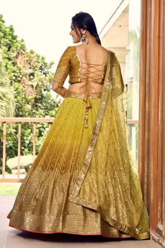 dark yellow silk blend embroidered traditional lehenga choli with free size upto 42