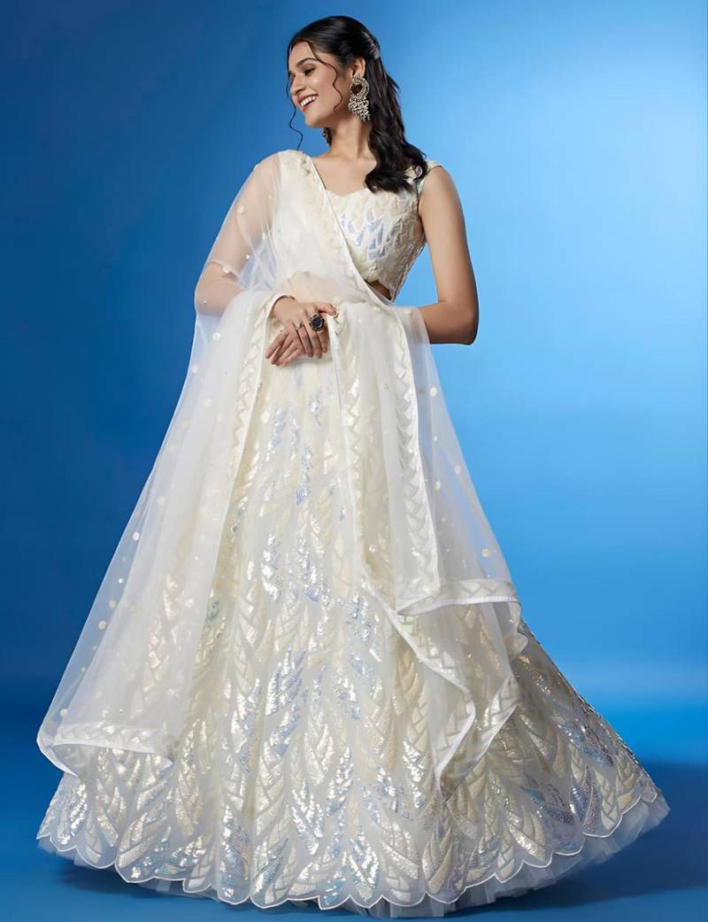 cream silk blend embroidered traditional lehenga choli with free size upto 42