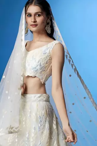 cream silk blend embroidered traditional lehenga choli with free size upto 42