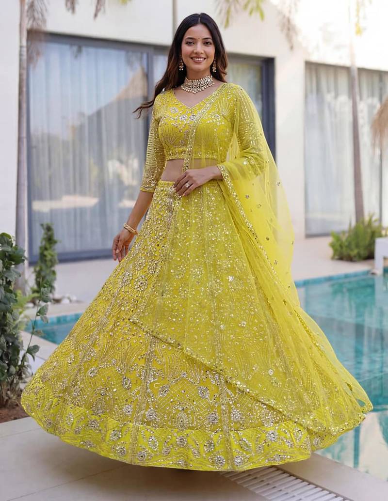 yellow net embroidered traditional lehenga choli