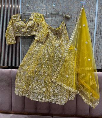 yellow net embroidered traditional lehenga choli 2