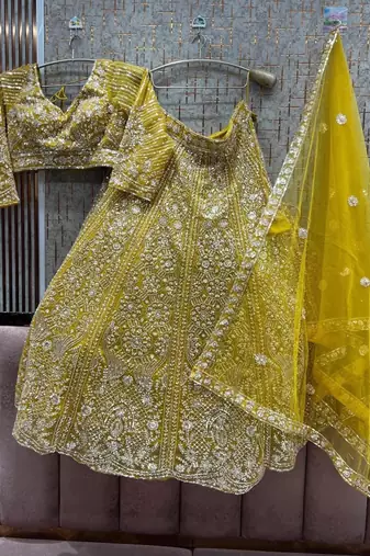 yellow net embroidered traditional lehenga choli