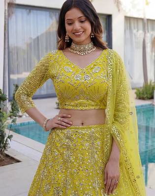 yellow net embroidered traditional lehenga choli 4