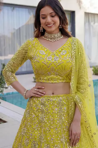 yellow net embroidered traditional lehenga choli