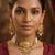 Gold-toned multi-strand pearl choker jewellery set with matching earrings