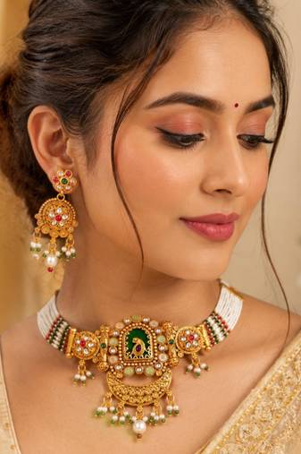 Gold-plated peacock & kundan studded choker jewellery set with earrings