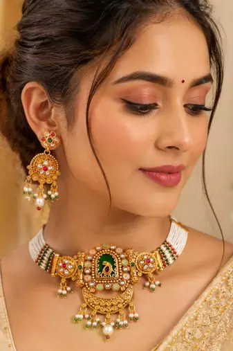 Gold-plated peacock & kundan studded choker jewellery set with earrings