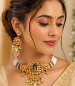 Gold-plated peacock & kundan studded choker jewellery set with earrings