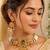Gold-plated peacock & kundan studded choker jewellery set with earrings
