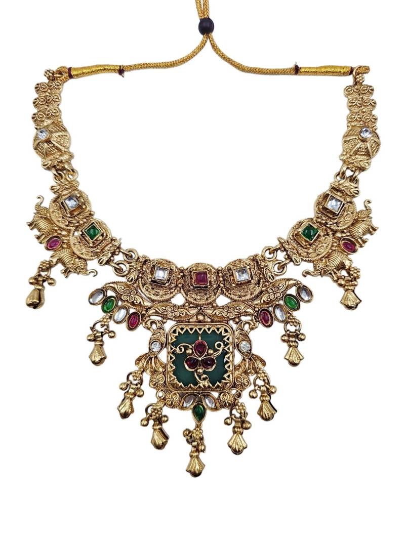 Women gold-toned & green temple antique jewellery set with maang tikka
