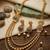 Gold-plated green meenakari & pink kundan-studded multi-strand long necklace set with earrings