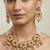 Women gold-plated kundan & multi-strand pearl jewellery set
