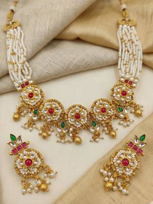 Women gold-plated kundan & multi-strand pearl jewellery set 4