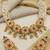Women gold-plated kundan & multi-strand pearl jewellery set