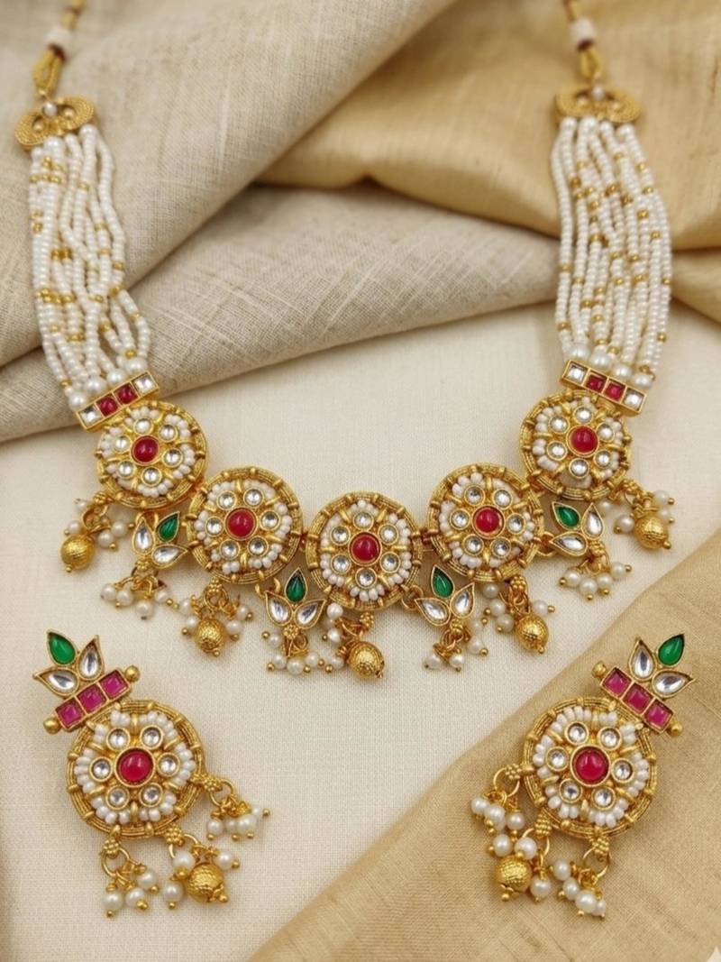 Women gold-plated kundan & multi-strand pearl jewellery set