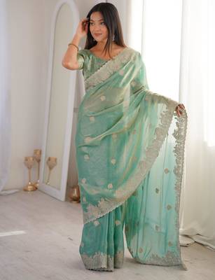Light green silk blend zari work embroidered saree 1