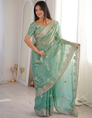 Light green silk blend zari work embroidered saree 3