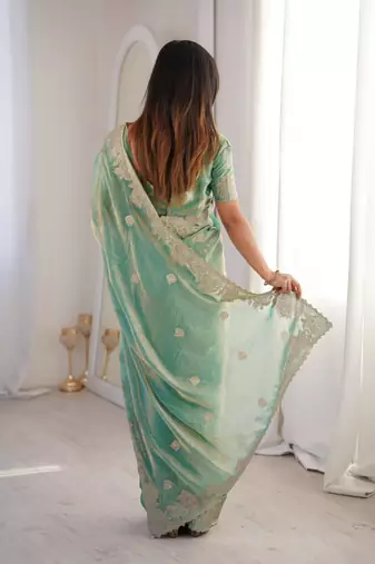 Light green silk blend zari work embroidered saree