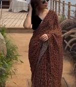Women   s brown leopard print saree with black blouse