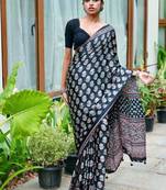 Beautiful black ajarakh print with real mirror work saree