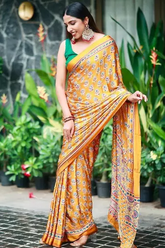 Beautiful yellow ajarakh print with real mirror work saree